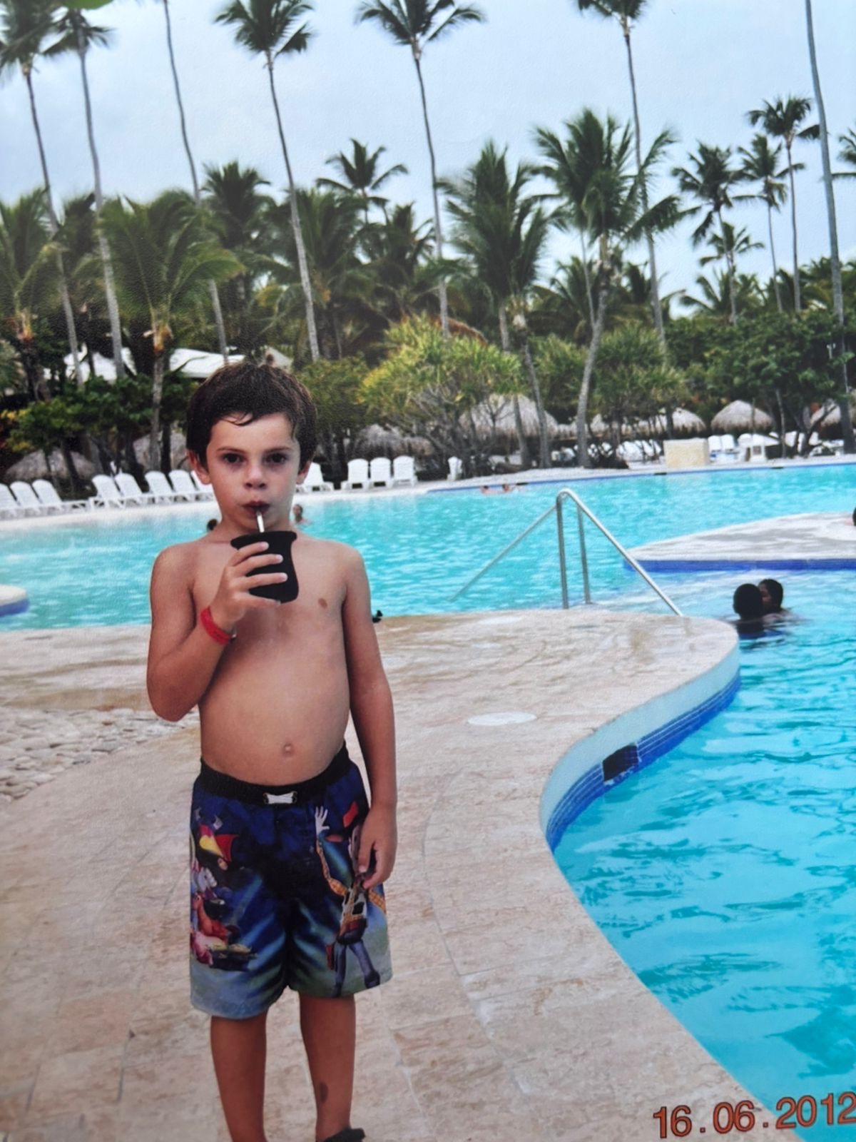 Franco at five years old, drinking mate